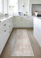 Farmhouse kitchen with white cabinets and Aethwy Washable Area Rug runner in light silver, prairie dust, silver gray, and slate blue. Roomscene-Runner