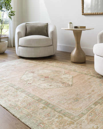 Living room scene with beige chairs and Luciana II Traditional Medallion Area Rug in beige, light green, and peach colors. Roomscene-Rectangle