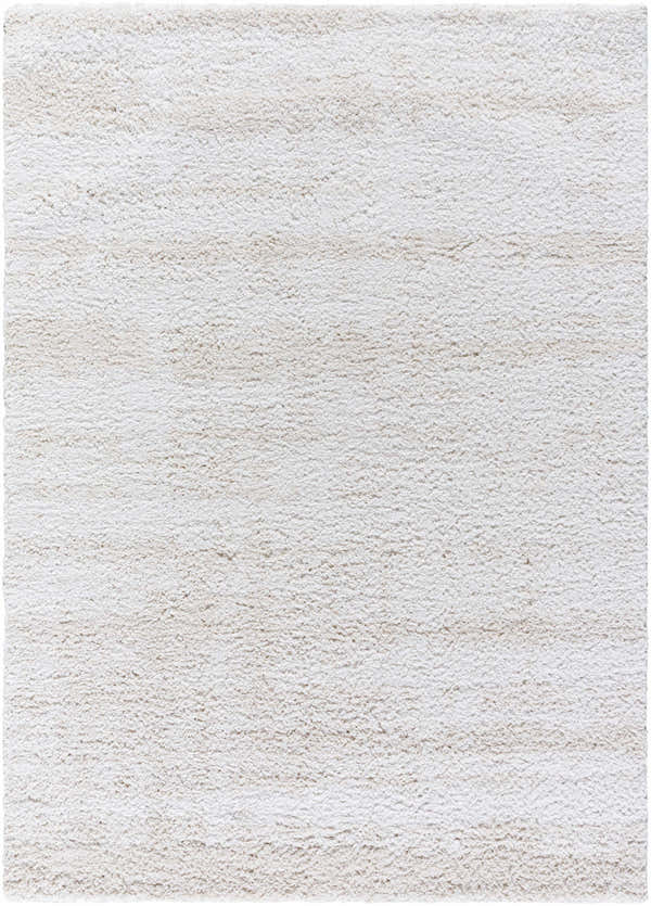 Close-up of the Arlind Area Rug. The shag rug has a soft, plush texture in medium gray and white hues. Design-Rectangle-537