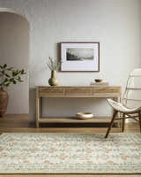 Neutral entryway with Alonsa Ivory rug, wood console table, woven chair, and textured white walls. Farmhouse style. Roomscene-Rectangle