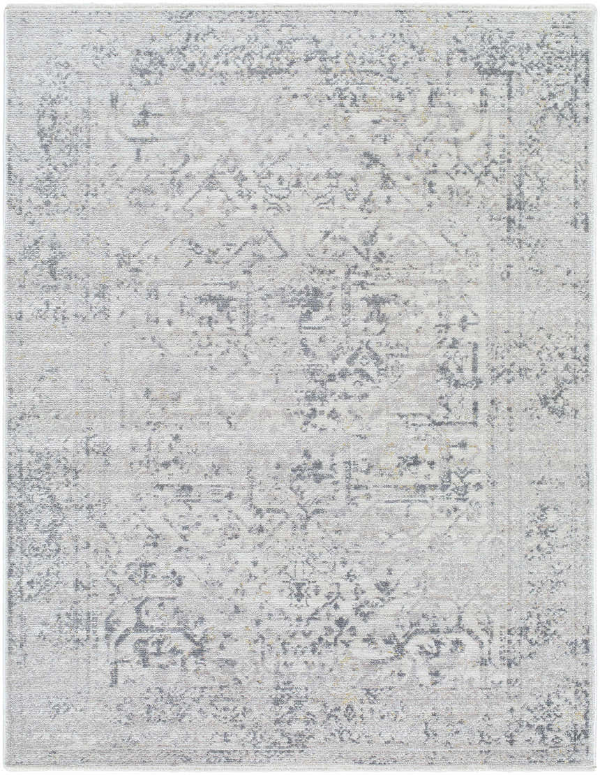 Close-up of the Alivia Area Rug. Machine-woven polyester rug in charcoal, dove gray, and ivory with a traditional pattern. Design-Rectangle-57