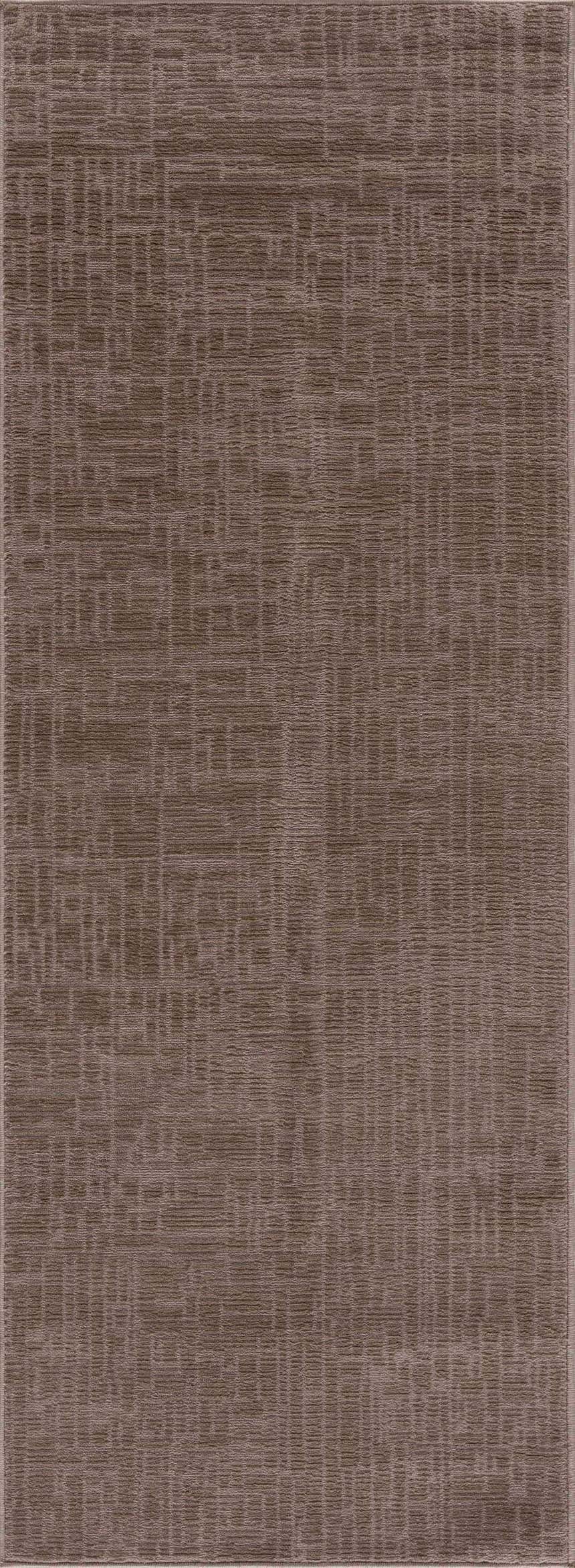 Close-up of the Leanna Light Brown Washable Area Rug, featuring a subtle geometric pattern and soft light brown tones. Design-Runner