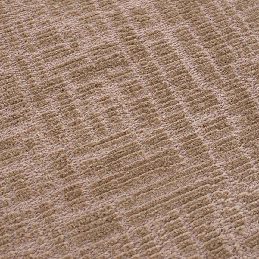 Close-up of the Leanna Light Brown Washable Area Rug. Shows texture and subtle geometric pattern. Texture