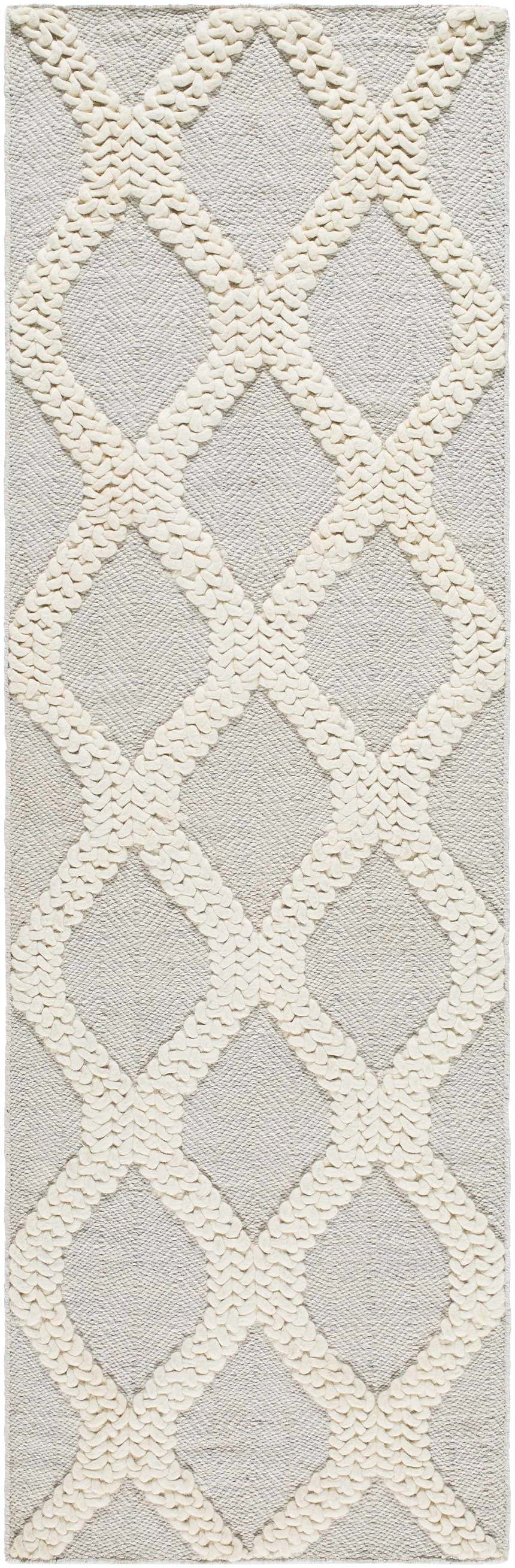 Close-up of the Dusan Area Rug. Arctic Stone and Cloud Gray rug with a raised geometric diamond pattern. Hand woven texture. Design-Runner-268