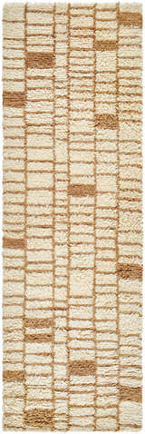 Close-up of the Anusha Area Rug. Beige and tan wool rug with a contemporary geometric block pattern. Hand-tufted texture. Design-Runner-268