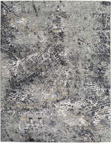 Close up of the Aolani Medium Gray Area Rug featuring a Southwestern-inspired black, gray, ivory, and tan pattern. Design-Rectangle-710102