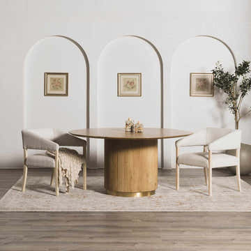 Dining room with round wood table on Elimbah Thick Luxe Area Rug. Beige rug with traditional pattern, chairs, and arched wall decor. Roomscene-Rectangle