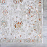 Close-up of Elimbah Thick Luxe Area Rug, showcasing its beige, brick red, and light gray traditional floral pattern. Swatch