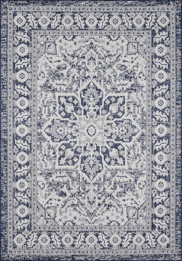 Close-up of the Etoile Navy Blue Performance Rug featuring a traditional, vintage-inspired floral pattern. Design-Rectangle