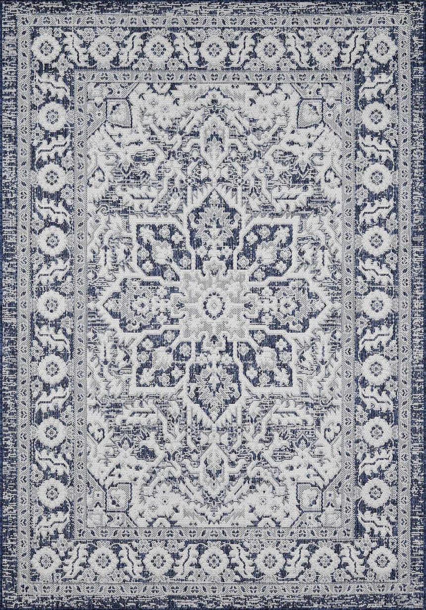 Close-up of the Etoile Navy Blue Performance Rug featuring a traditional, vintage-inspired floral pattern. Design-Rectangle