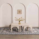 Dining room scene with a navy blue Etoile rug, light wood table, benches, and arched wall details. Roomscene-Rectangle