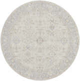 Close-up of a round Feray Thick Luxe Area Rug. Features traditional floral patterns in cloud gray, nutmeg, and light gray. Design-Round-67