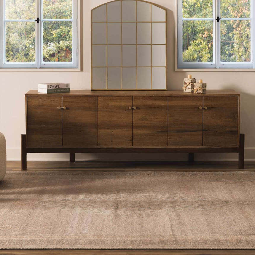 Living room scene with a taupe Luciana Handmade Galey Alix x LIVABLISS rug under a wooden console table. Roomscene-Rectangle
