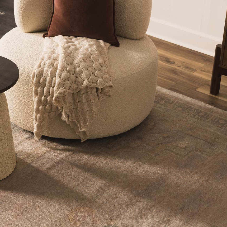 Close-up of the Luciana Handmade Galey Alix x LIVABLISS GALU-2300 Area Rug in taupe, antique gold, and charcoal. Styleshot