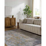 Living room scene with a beige sofa and the gray, beige Follansbee Area Rug. Roomscene-Rectangle