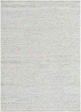 Close-up of the Alezae Ivory Area Rug. Machine woven rug with ivory, light gray, and pale blue hues. Design-Rectangle-57
