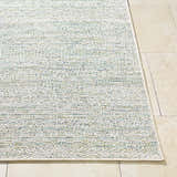 Close-up of the Alezae Ivory Area Rug showing its woven texture and subtle ivory, gray, and blue colors. Front