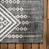 Close-up of the Frankville Black&White All Over Performance Rug. Features a geometric, Southwestern-inspired pattern. Swatch