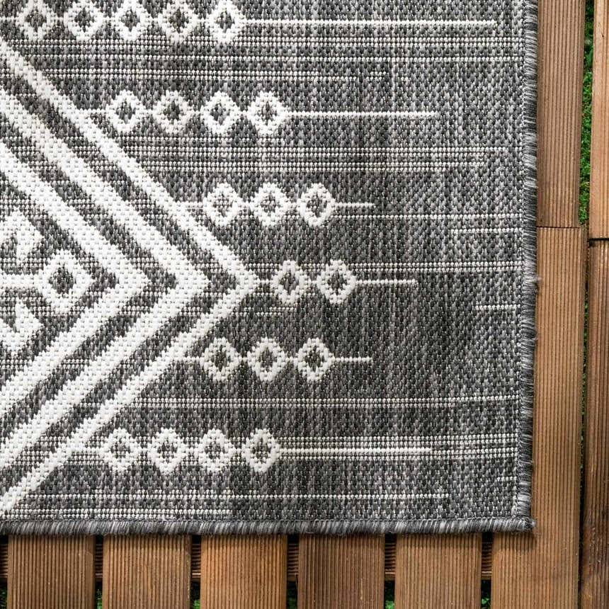 Close-up of the Frankville Black&White All Over Performance Rug. Features a geometric, Southwestern-inspired pattern. Swatch