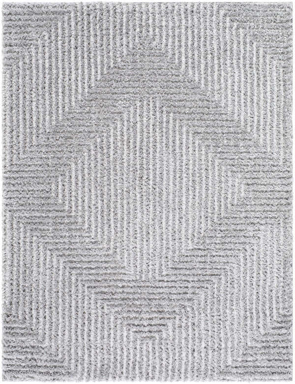 Close-up of the Ashlyn Gray Area Rug featuring a geometric pattern and shag texture in light slate and gray. Design-Rectangle-537
