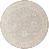 Close-up of a round Giang Thick Luxe Area Rug in beige and gray with a traditional floral pattern. Design-Round-67