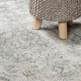 Close-up of the Gilmanton Thick Luxe Boutique Rug in dusty sage, gray, and beige with a traditional pattern and soft texture. Styleshot