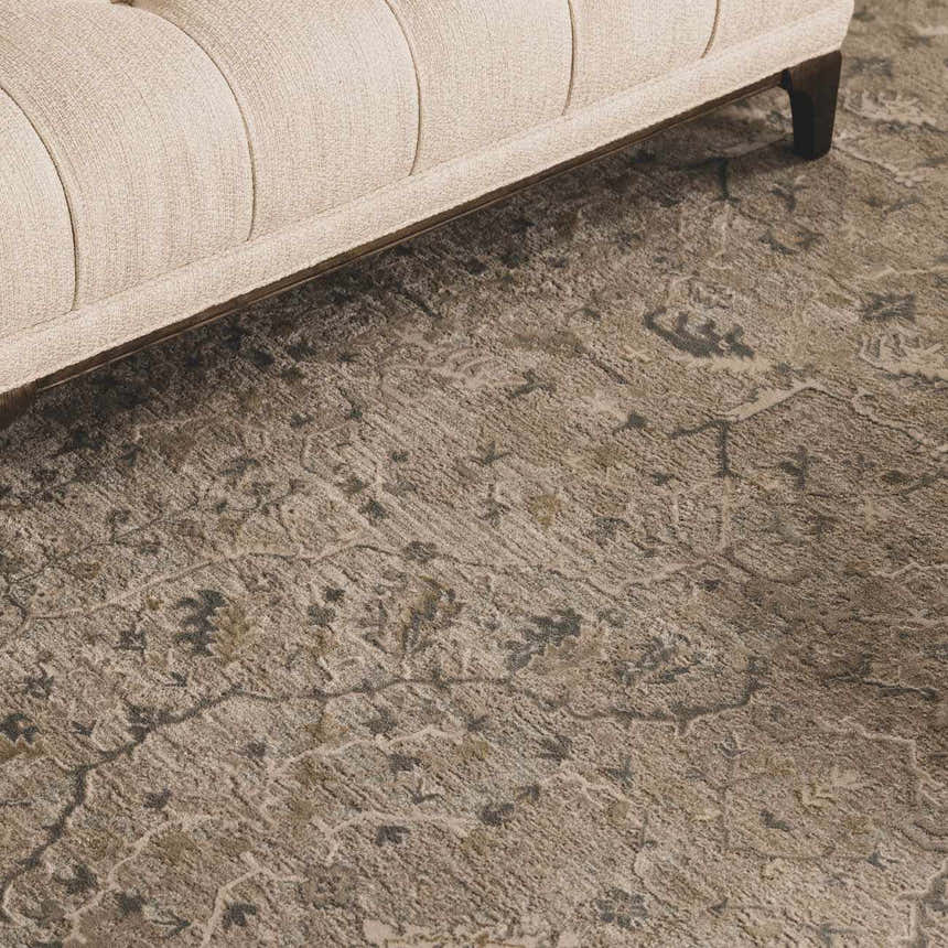 Close up of the Glengarry Thick Luxe Boutique Rug, showcasing its beige, gray, and taupe vintage pattern and plush texture. Roomscene-Rectangle