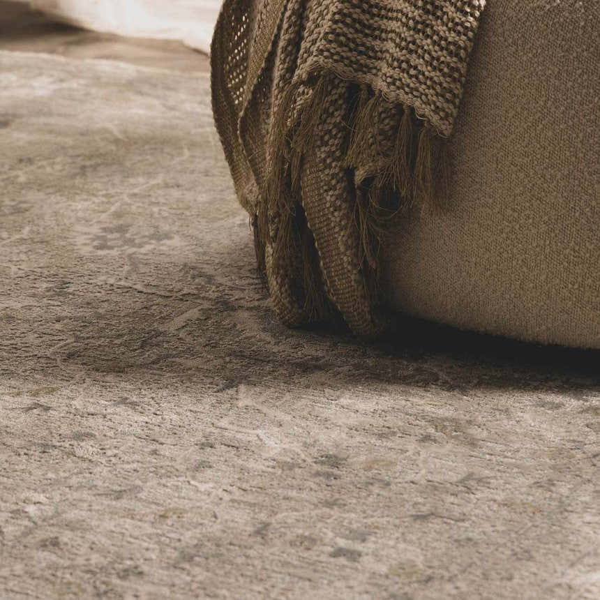 Close-up of the Glengarry Thick Luxe Boutique Rug in dusty sage and light beige with a vintage pattern and soft texture. Roomscene-Rectangle