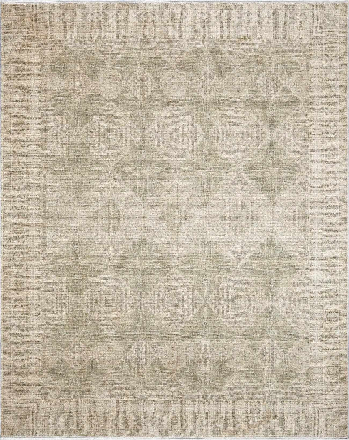 Close-up of Fetscher IV Vintage Damask Area Rug. Light brown, olive, and peach tones with a traditional damask pattern. Design-Rectangle
