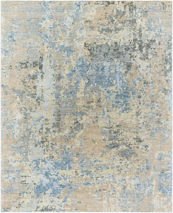 Close-up of the Greenhills Handmade Wool Area Rug, featuring beige, charcoal, and blue abstract patterns. Design-Rectangle-810
