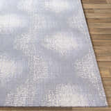Close-up of Simpatico Candice Olson SPO-1008 rug. Cream, gray, and light blue contemporary design, machine woven wool texture. Front