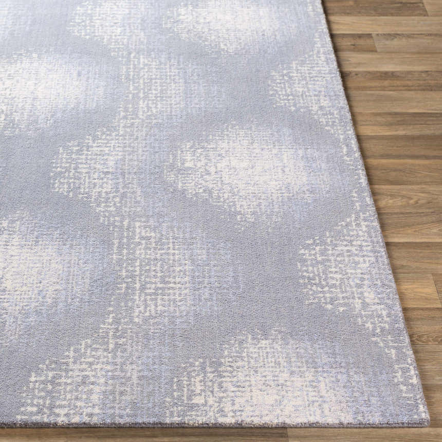Close-up of Simpatico Candice Olson SPO-1008 rug. Cream, gray, and light blue contemporary design, machine woven wool texture. Front
