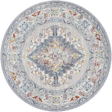 Close-up of the round Haymond Area Rug. Features a traditional pattern in brick red, charcoal, cream, and blue tones. Design-Round-65