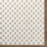 Close-up of the Anthea Light Gray Washable Area Rug featuring a textured white and light gray checkerboard pattern. Corner