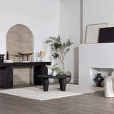 Minimal living room scene with a cream Andia Plush Grid Rug, black furniture, and neutral decor. Roomscene-Rectangle