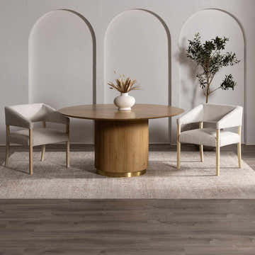 Dining room scene with round wood table, chairs, and Galey Alix x Livabliss Myrtle Avenue I Area Rug in taupe and cream. Roomscene-Rectangle