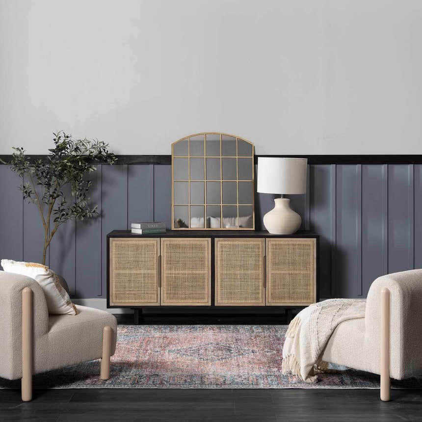 Living room scene with a Blue Burgundy Holi-2302 rug, beige chairs, and a wood cabinet with a mirror. Roomscene-Rectangle