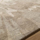 Close up of the hand-tufted Ilfeld Athena Gray Floral Wool Rug showing floral pattern and texture. Texture