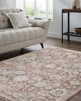 Living room scene with a beige sofa and the Urara Red Area Rug, showcasing a traditional farmhouse style. Roomscene-Rectangle