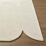 Close up of the Jgadve Ivory Abstract Rug showing a textured, horizontal striped pattern. Front