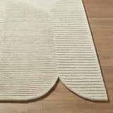 Close-up of the Ecru Abstract Modern Hand Tufted Wool Area Rug. Features horizontal stripes and a unique curved edge. Front