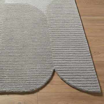 Close up of Fixui Gray Abstract Hand Tufted Wool Area Rug showing texture and horizontal line pattern. Front
