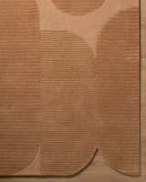 Close up of the Fihe Abstract Modern rug showing its terracotta color, wool texture, and geometric design. Corner