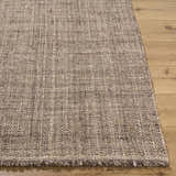 Close up of the hand woven texture of the Pufoe Modern Wool Area Rug in neutral tones. Front