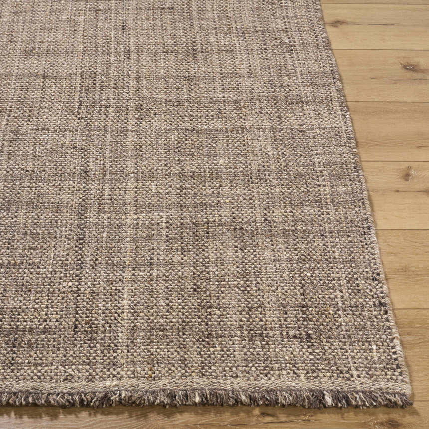 Close up of the hand woven texture of the Pufoe Modern Wool Area Rug in neutral tones. Front