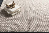 Close-up of the hand woven Keldron Clearance Rug. Charcoal and cream wool and viscose blend with textured, contemporary design. Styleshot