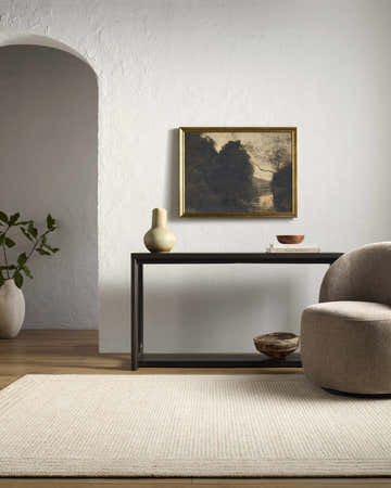 Entryway with textured walls, dark console table, and Kayoko Off White Area Rug. Roomscene-Rectangle