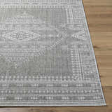 Close-up of the gray and white Asuman Area Rug, showcasing its traditional geometric pattern and woven texture. Front