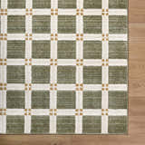Close up of Kalkin Olive Area Rug featuring a contemporary olive, cream, and tan grid pattern. Corner