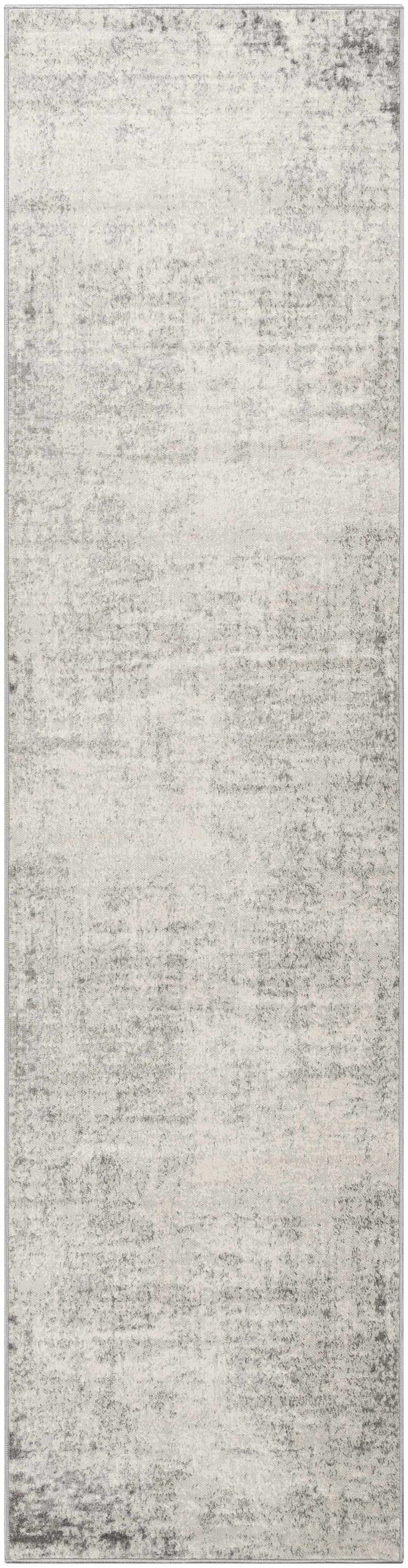 Close-up of the Kalanganan Abstract Gray Rug, showcasing its charcoal, gray, and off-white contemporary design. Design-Runner-2710